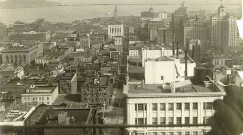 [Aerial view of the city looking onto Sacramento Street]