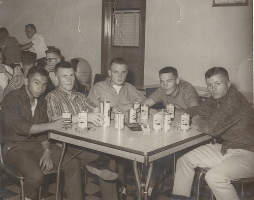 Young Service Men Enjoying Some Beers