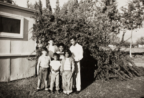 Kids Standing in Front of the Living Quarters at Briggs Labor Camp in Santa Paula, CA