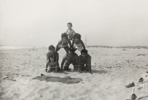 Friends Form a Pyramid at Oxnard Shores Beach in Oxnard, CA