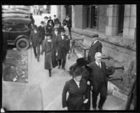 People walking into the courthouse for Arthur C. Burch murder trial, Los Angeles, 1921-1922