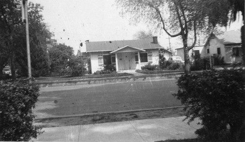 Photograph of a house one block north of Garvey at Garfield