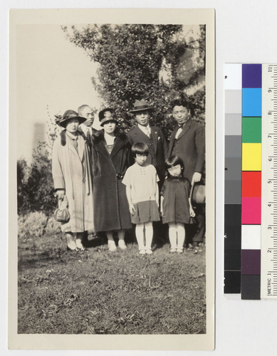 Keiko (is 7) & Yoshiko (is 4 or 5 yrs.) unhappy at church--Mom, far left, Dad far right. in 1925? Uchida family: Dwight, Iku, Keiko, Yoshiko