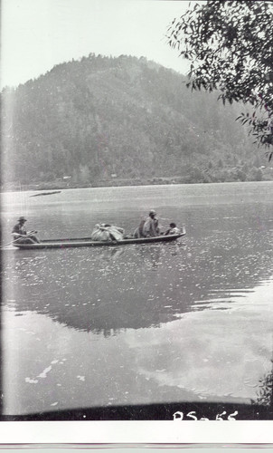 Klamath River: "Old-fashioned" canoe, carrying Harry K. Roberts and Ruth Roberts