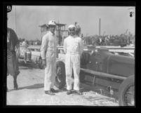 Race car driver Pete de Paolo with crew member in Culver City, Calif., 1927
