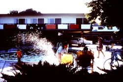Swimming pool area next to apartments in Sebastopol, California, 1970