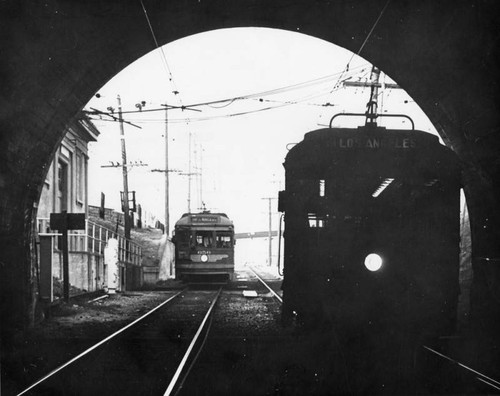 Two PE cars entering tunnel