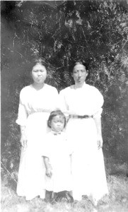 two women and a young girl