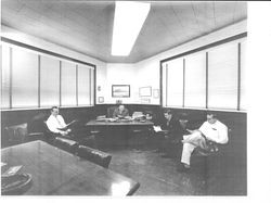 Gene Benedetti and other officials meeting at Petaluma Cooperative Creamery, Petaluma, California, 1963
