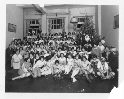Christmas - Calif. - Stockton: Group photo of Christmas gathering in an unidentified building