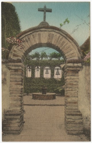 Sacred Garden showing Bell Wall or Campanario. Old Mission San Juan Capistrano, California