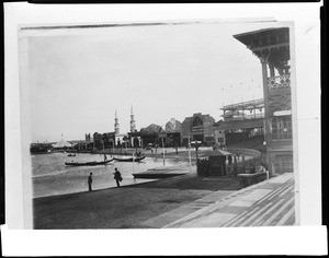View of the Venice Midway and Lagoon, showing amusment rides and gondolas, ca.1920