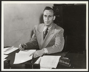 D. C. Cochran at his desk