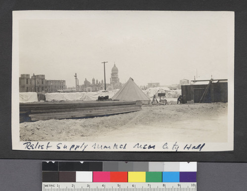 Relief supply market near City Hall. [St. Ignatius Church and College, left.]