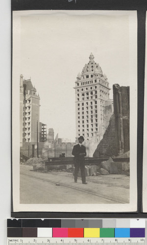 [Pedestrian in street. Geary St.? Call Building in background.]