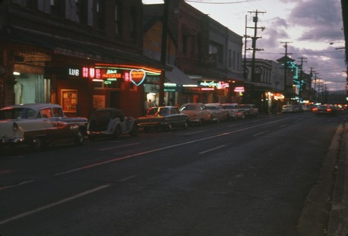During a break from the Swan Song Expedition (1961) a member of the crew took this photo of what was considered \"Sin Street\", in Honolulu, Hawaii. December 1961