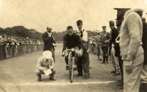 BIcycle racer in goggles at start of race
