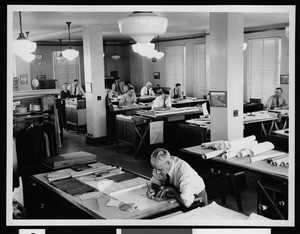 Draftsmen working in a Department of Public Works office