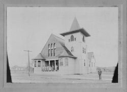 St. Sebastian Catholic Church on Santa Rosa (Sebastopol) Avenue, Sebastopol, October 1898, with men on steps and beside church wearing working clothes/aprons