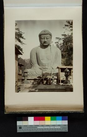 Photograph of monk in front of the Daibutsu (Great Buddha) in Kamakura