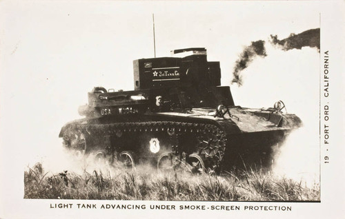 Light tank advancing under smoke-screen protection