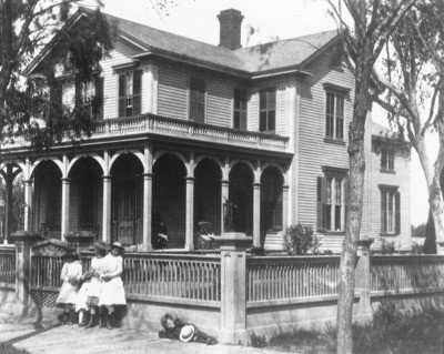 Dwellings - Stockton: [Home of Andrew Simpson, children in front, El Dorado St. and Oak St.]