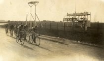 Cyclists racing on dirt track