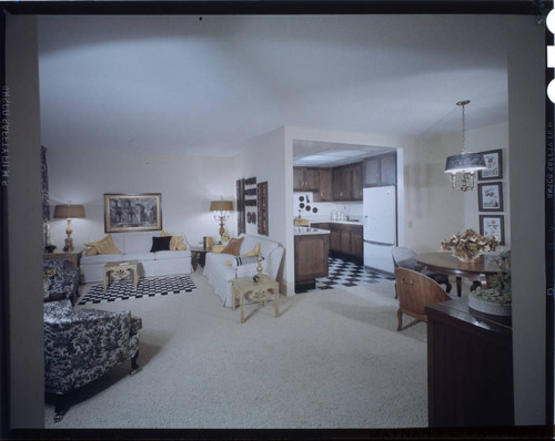 [Unidentified living and dining areas]