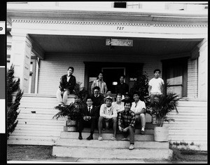 Group of young men in front of the Gakusei Kai fraternity house