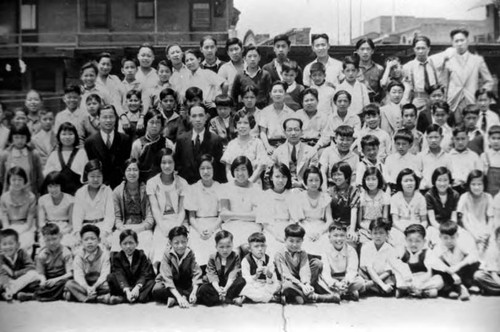 Center of Los Angeles Chung Hua School group picture. On the back: Harry Quillen 418 s. Ramona Ave., Monterey Park, CA)