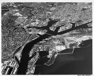 Aerial view of the main channel of the Los Angeles Harbor over San Pedro, East San Pedro, Terminal Island