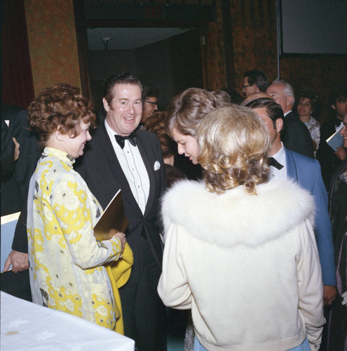 Guests mingling at Pepperdine's Birth of a College dinner, 1970