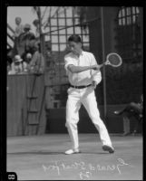 Gerald Stratford playing tennis, [Pasadena?], 1928