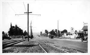 Looking westerly on Santa Barbara Avenue at Arlington showing two way roads on each side of the Los Angeles Railway tracks, Los Angeles, 1928