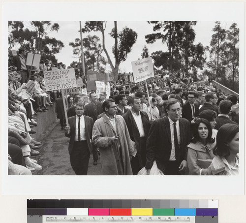 Sociology Graduate students and teaching assistants carrying signs in the Greek Theater