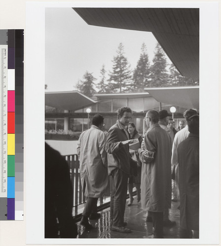 Mario Savio talking with Tom Collins on the Student Union balcony