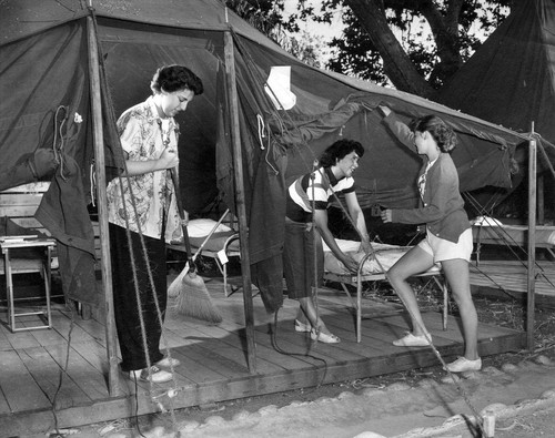 Girls setting up tent at Brandeis Camp Institute