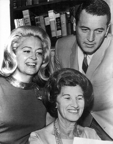 Rock Hudson and Marilyn Maxwell visit the library before performing at University Women's fundraising event