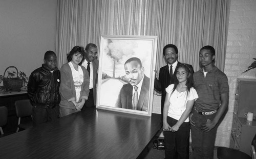 Edward Markham School students posing with a portrait of Dr. Martin Luther King Jr., Los Angeles, 1986