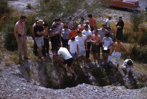 Examining a depression in the salt flats