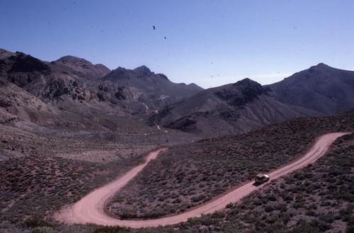 Driving a Jeep along the winding road of Titus Canyon