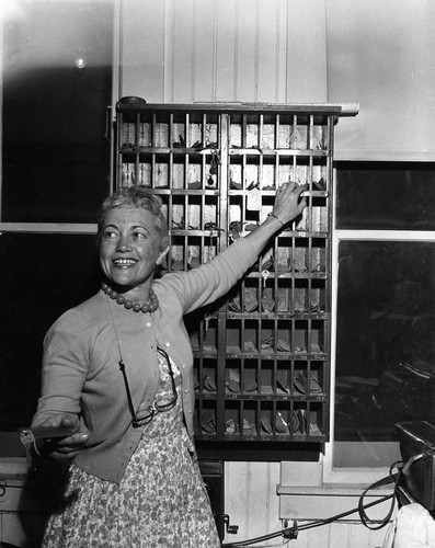 Woman handing out keys