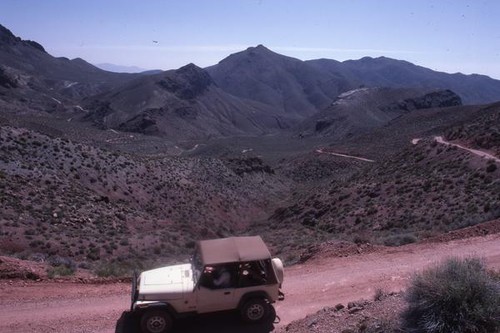 Driving a Jeep along the winding road of Titus Canyon