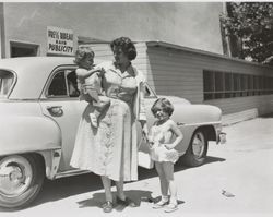 Carmen Silvershield Formway and her daughters outside the Sonoma County Fair publicity office, Santa Rosa, California, about 1955