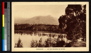 View of a lake encircled by forest, Madagascar, ca.1920-1940