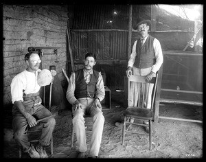 Three men in the Mexican Custom House, just below the first heading of the Colorado River, near Mexicali, ca.1910