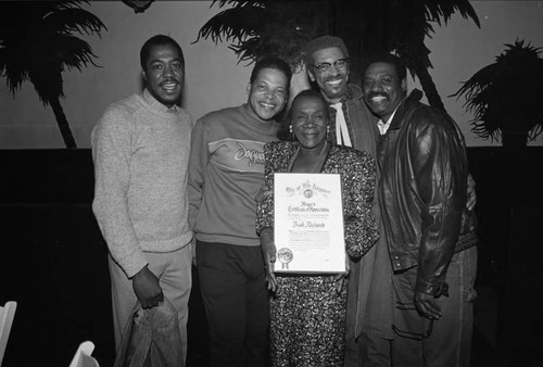 Beah Richards and others posing with a Certificate of Appreciation, Los Angeles, 1987