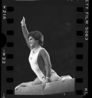 Gymnast Mary Lou Retton performing on the beam during Olympic Vidal Sassoon Looking Good Tour in Los Angeles, Calif., 1985
