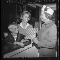 Jay North (aka Dennis the Menace) and actress Beverly Garland open Christmas Seal booth in Los Angeles, Calif., 1962