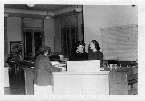 Grand Avenue Library, with staff at adult desk